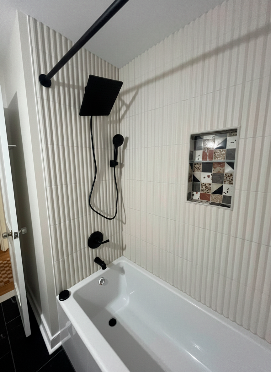 Professional tile installation in Richmond bathroom with decorative wall tiles and modern finish by Break & Build Interiors