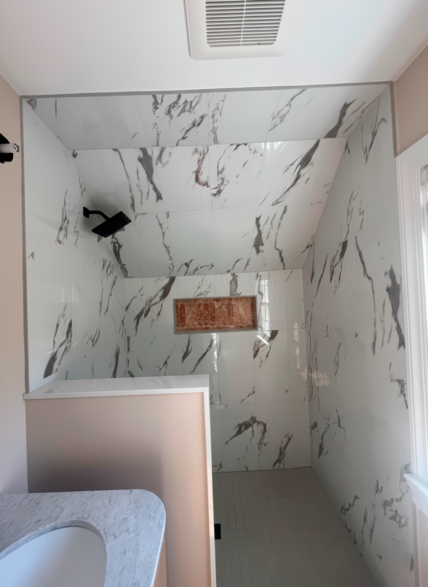 Professional tile installation in Richmond bathroom with decorative wall tiles and modern finish by Break & Build Interiors